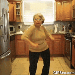 A grandmother dancing in her kitchen